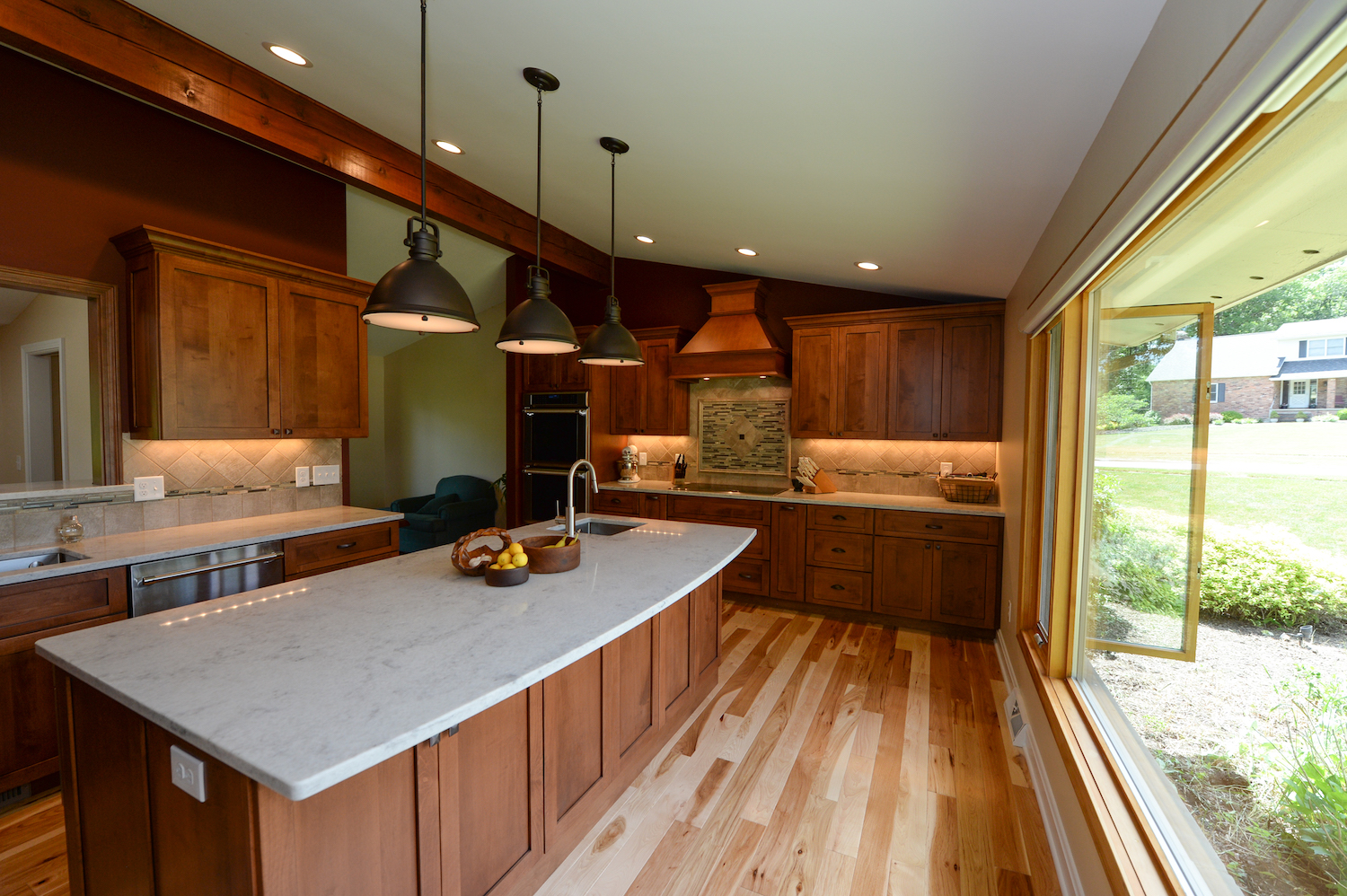 kitchen with wood cabinets and marble counter